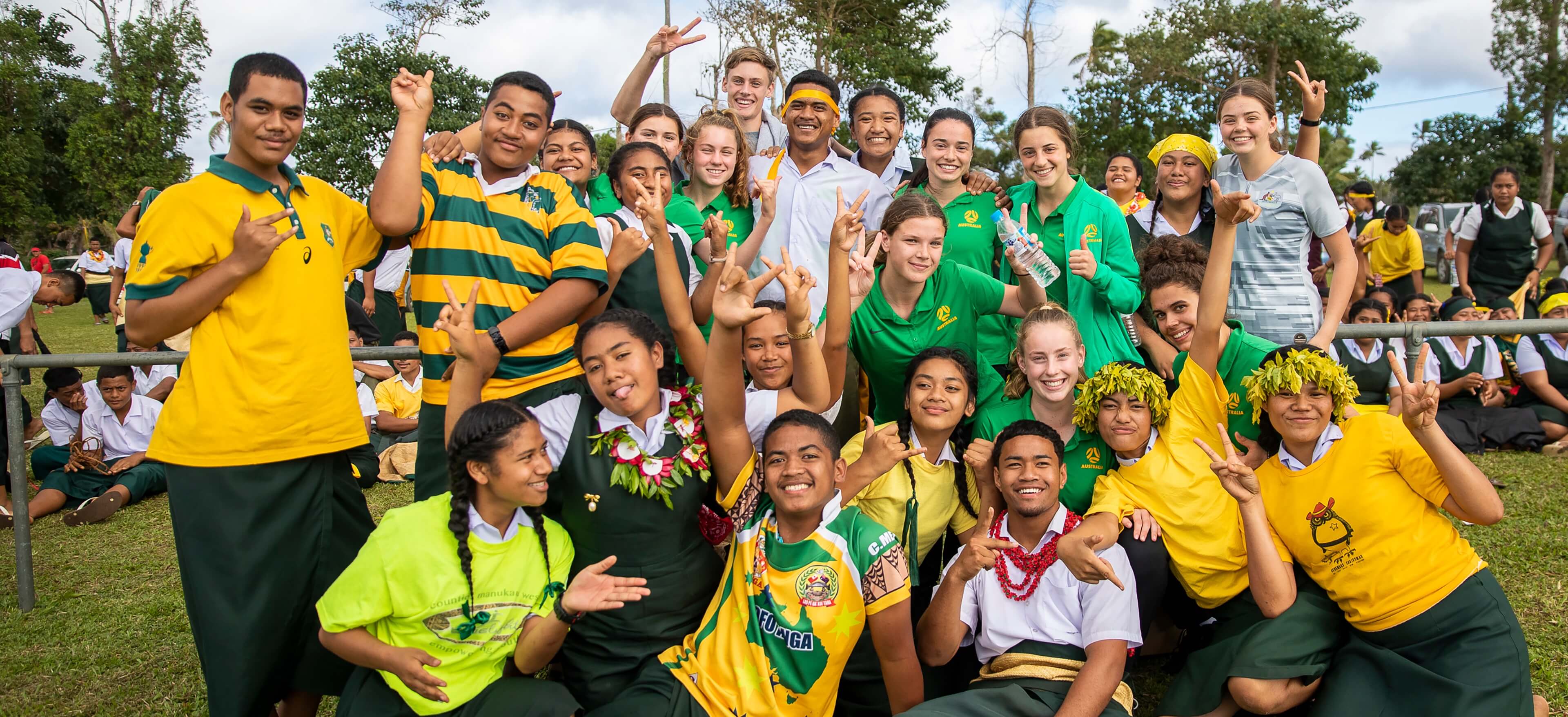 Teams from Tonga and Australia celebrate