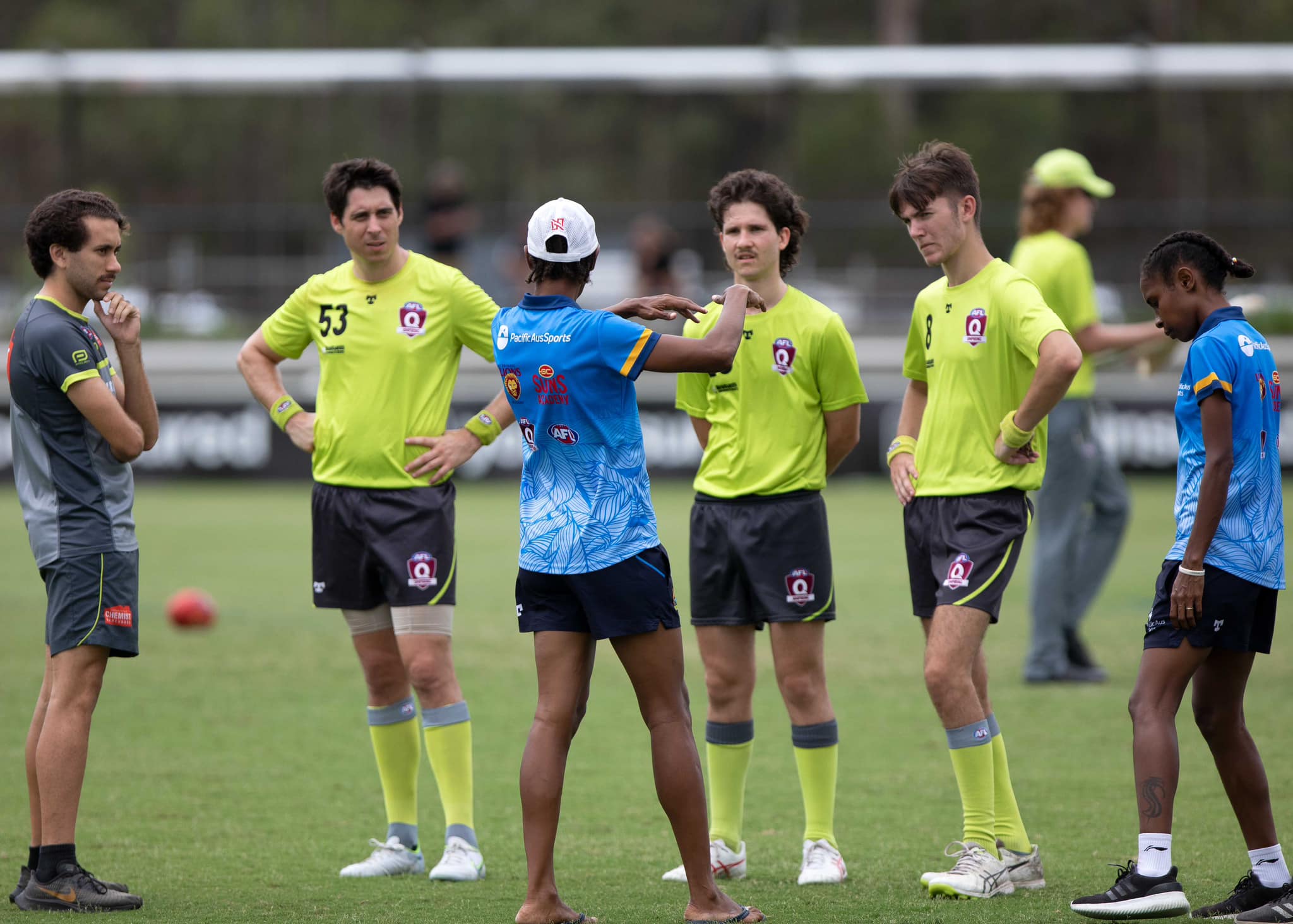 AFL players and Multicultural Ambassador in conversation