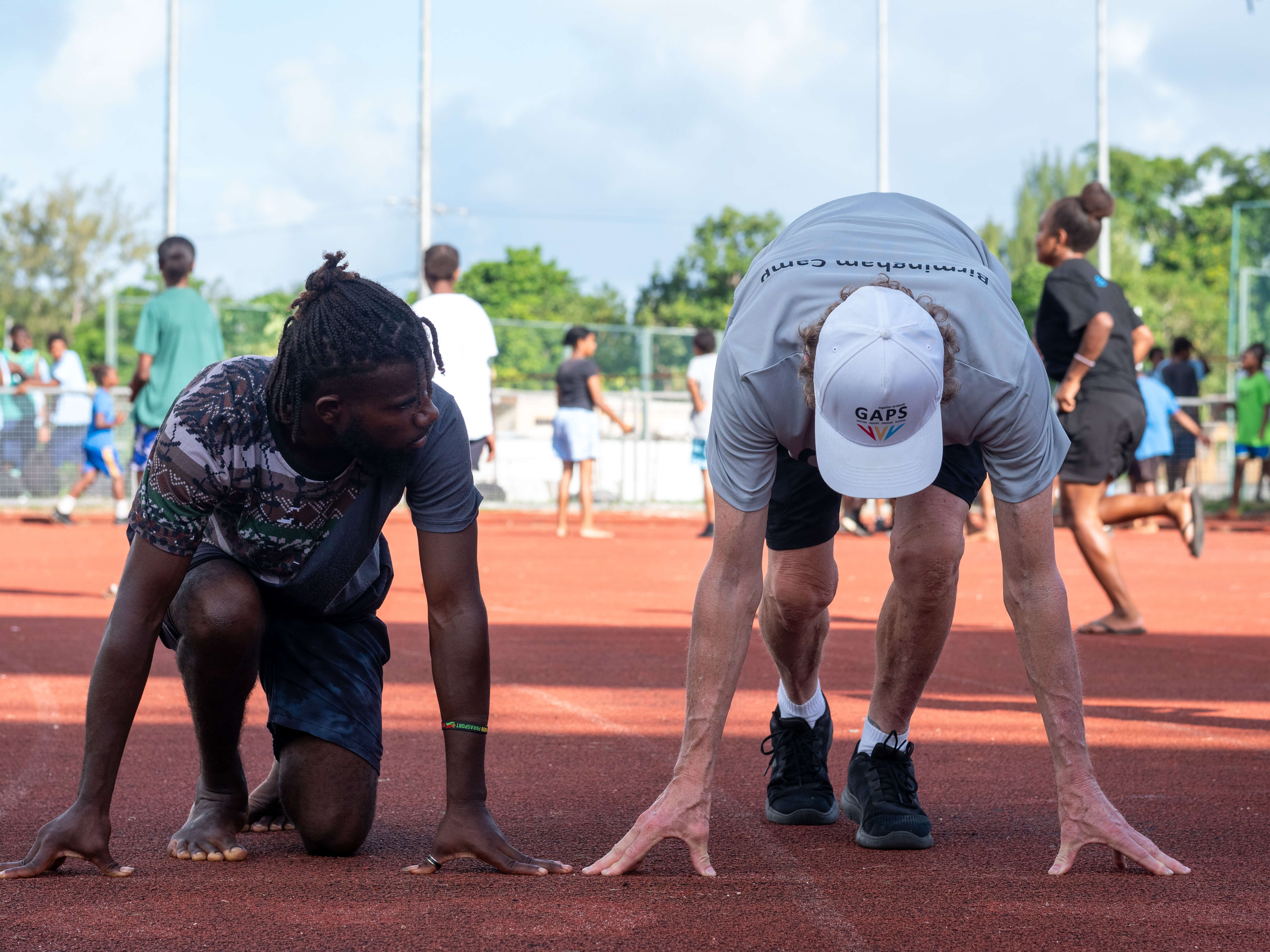 GAPS instructor with an athlete on starting line